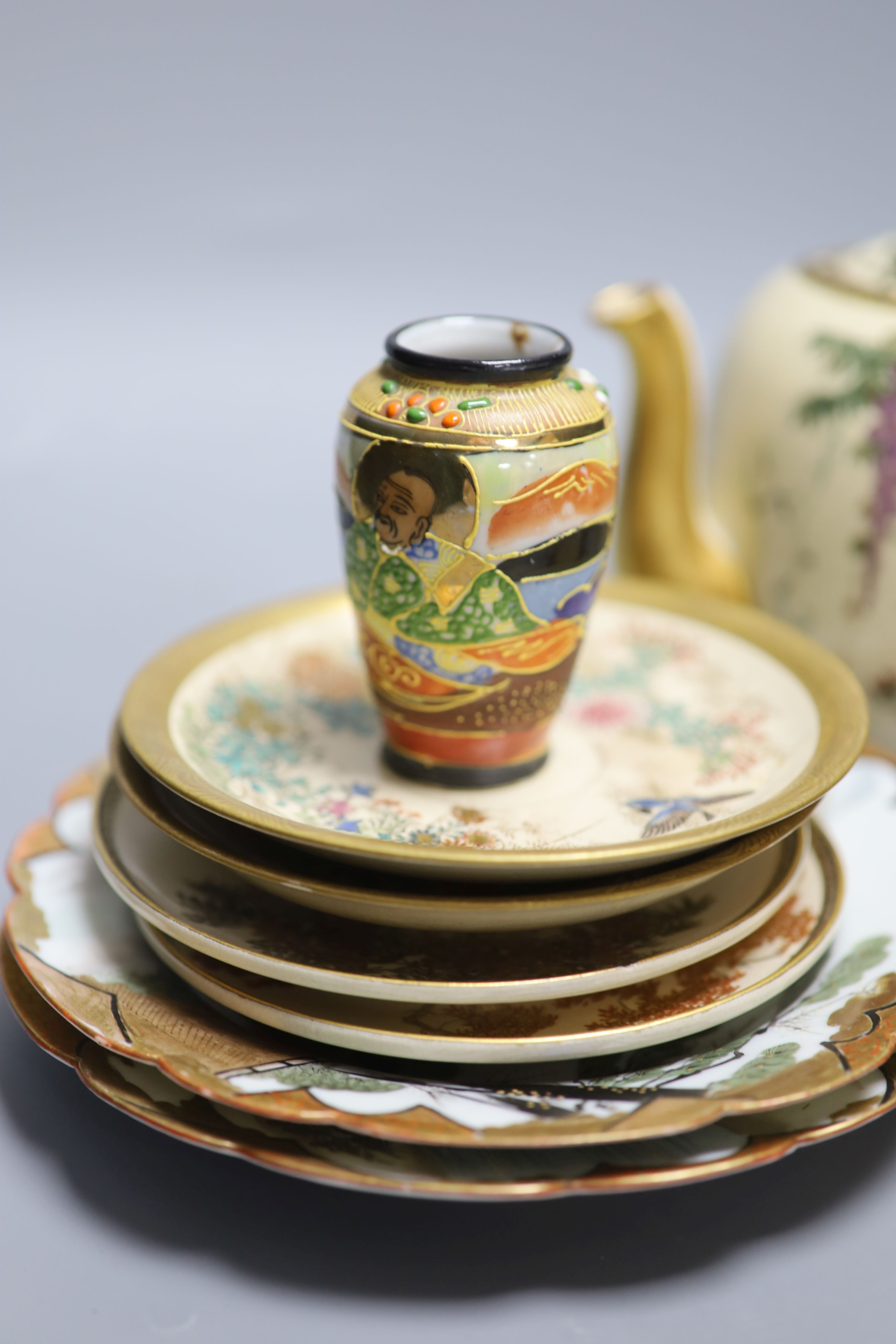 A group of Japanese cloisonne and satsuma wares